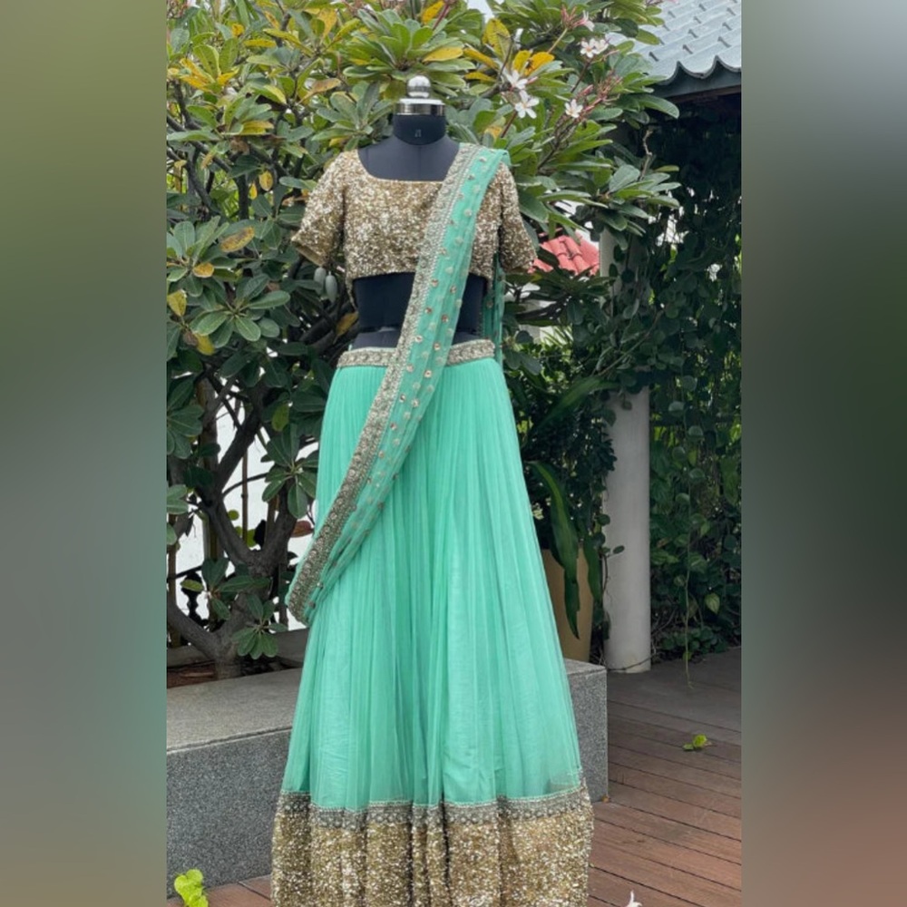 Sabyasachi Green and Gold Embellished Lehenga Choli